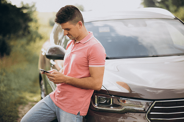Person using Josh Fuels app on smartphone to order fuel
